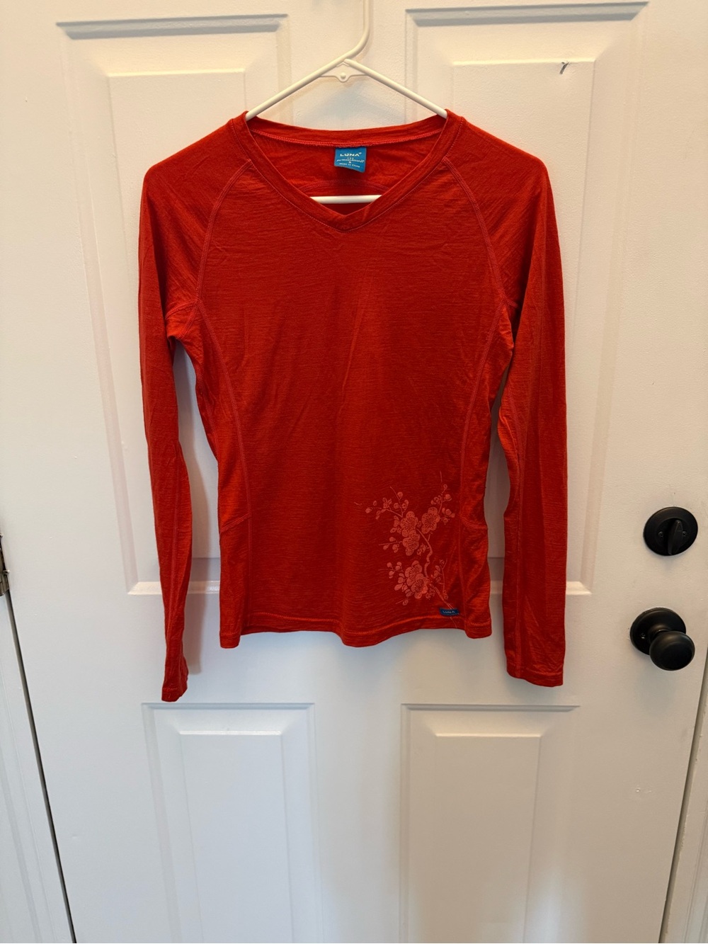 Luna  Women's Long Sleeve V-Neck Tee in orange floral